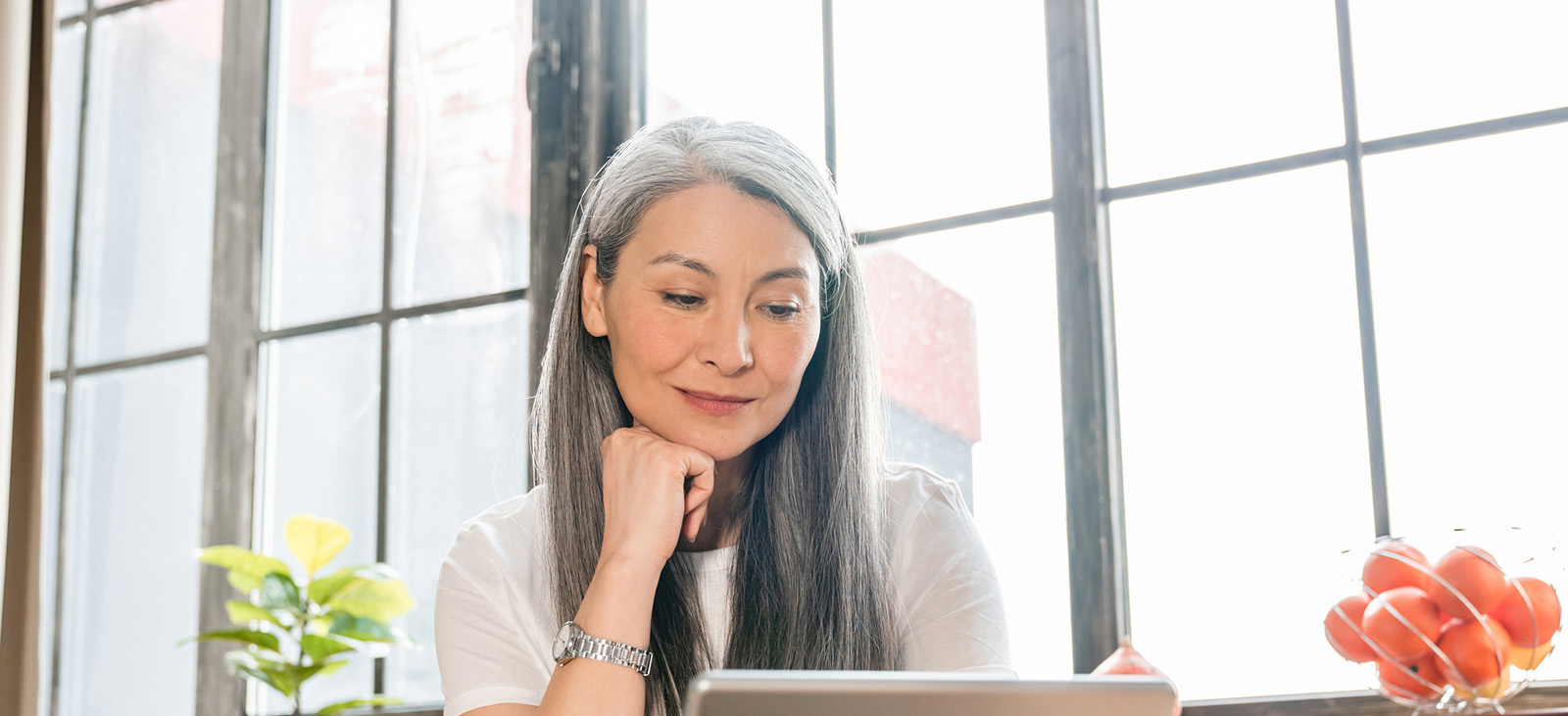 Clients daughter reviewing mothers daily care notes online