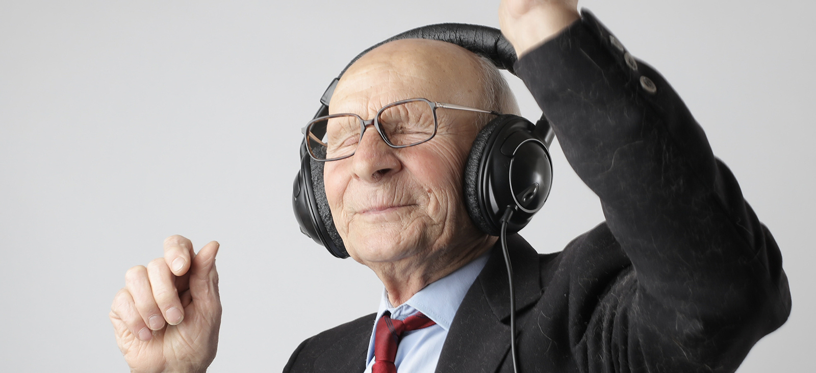 senior having a good time with music